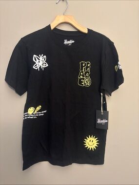 Brooklyn Supply Co. Black Graphic 'Peace' Tee with Yellow Accents